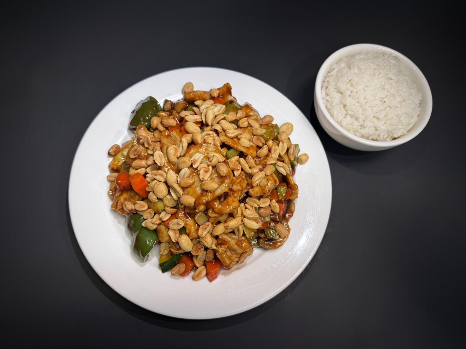 Kung pao chicken tossed with peanuts, bell peppers and diced vegetables with rice at Lucky House, a Chinese restaurant in Surprise