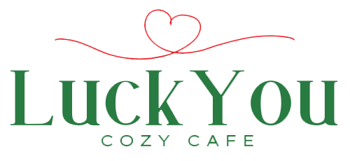 Brand logo of LuckYou Cozy Cafe, with green “LuckYou” and “COZY CAFE”, decorated by red heart - shaped curve