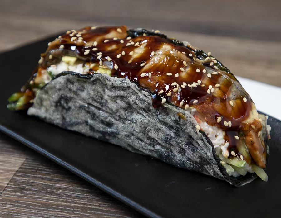 Taco with grilled eel, teriyaki sauce, sesame seeds at Lucky Tacoshi, a Japanese Restaurant in West Covina