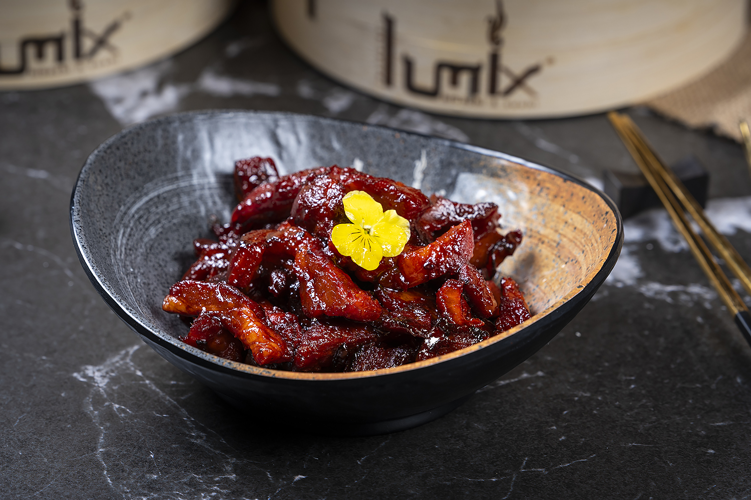 Glazed pork belly pieces served