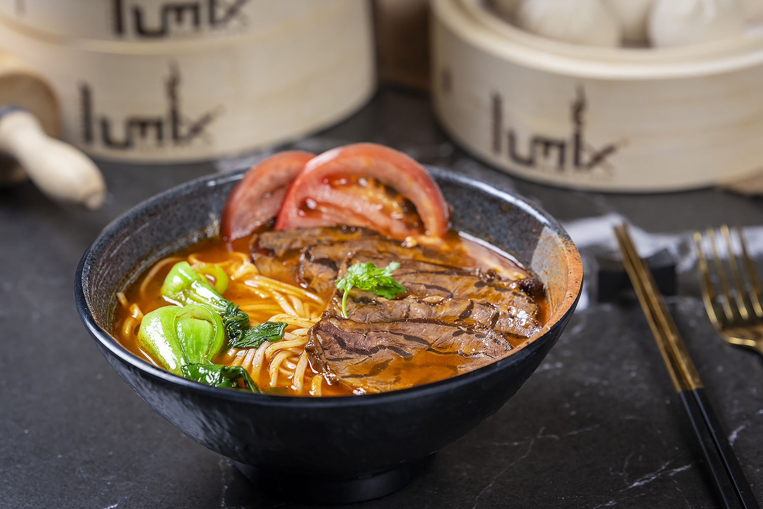 Beef noodle soup with vegetables and tender beef slices