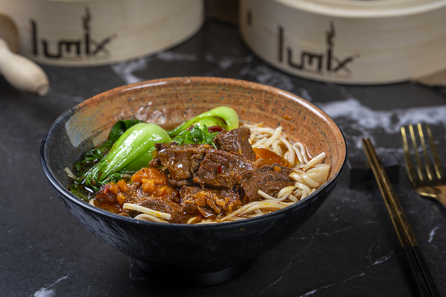 Braised beef noodle soup with bok choy and rich broth