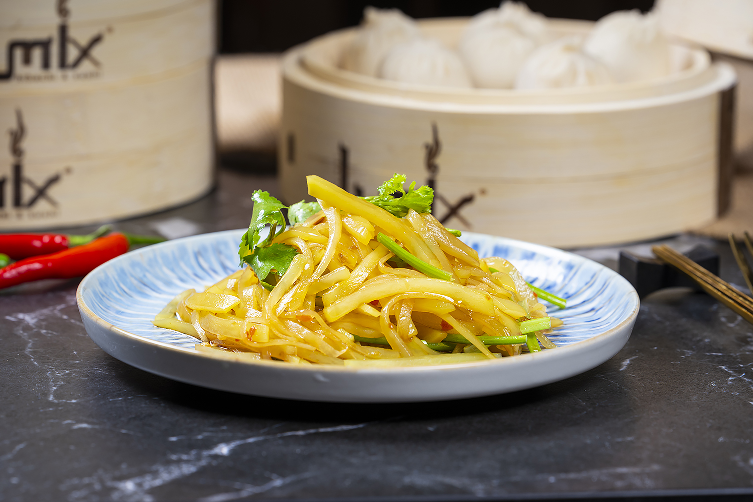 Stir-fried shredded potatoes with fresh herbs