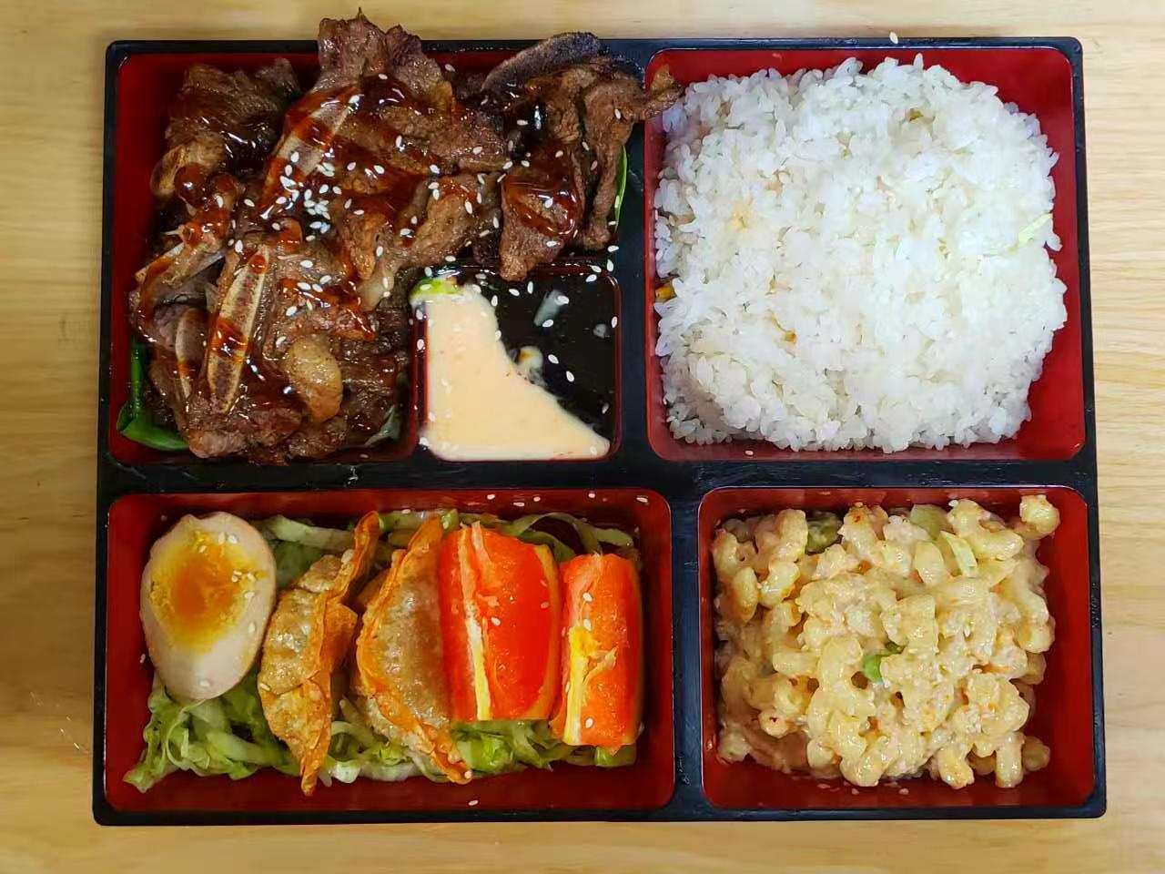 Beef BBQ bento box with rice, macaroni salad and dumplings at Luv Ramen & BBQ, a Japanese restaurant in Hawthorne