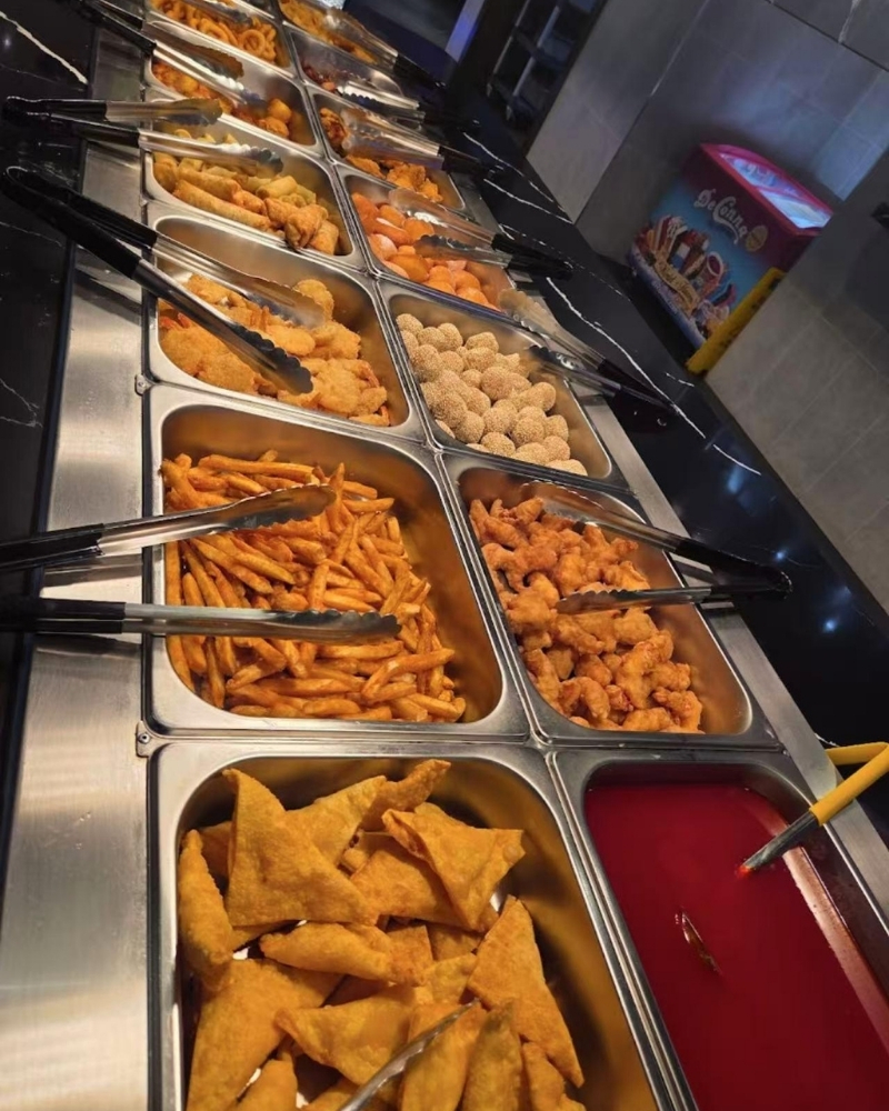 Fried appetizers and snacks station at Madness Buffet, a Buffet Restaurant in Pompano Beach