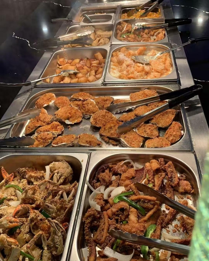 Fried seafood including oysters, crab and squid at Madness Buffet, a Buffet Restaurant in Pompano Beach
