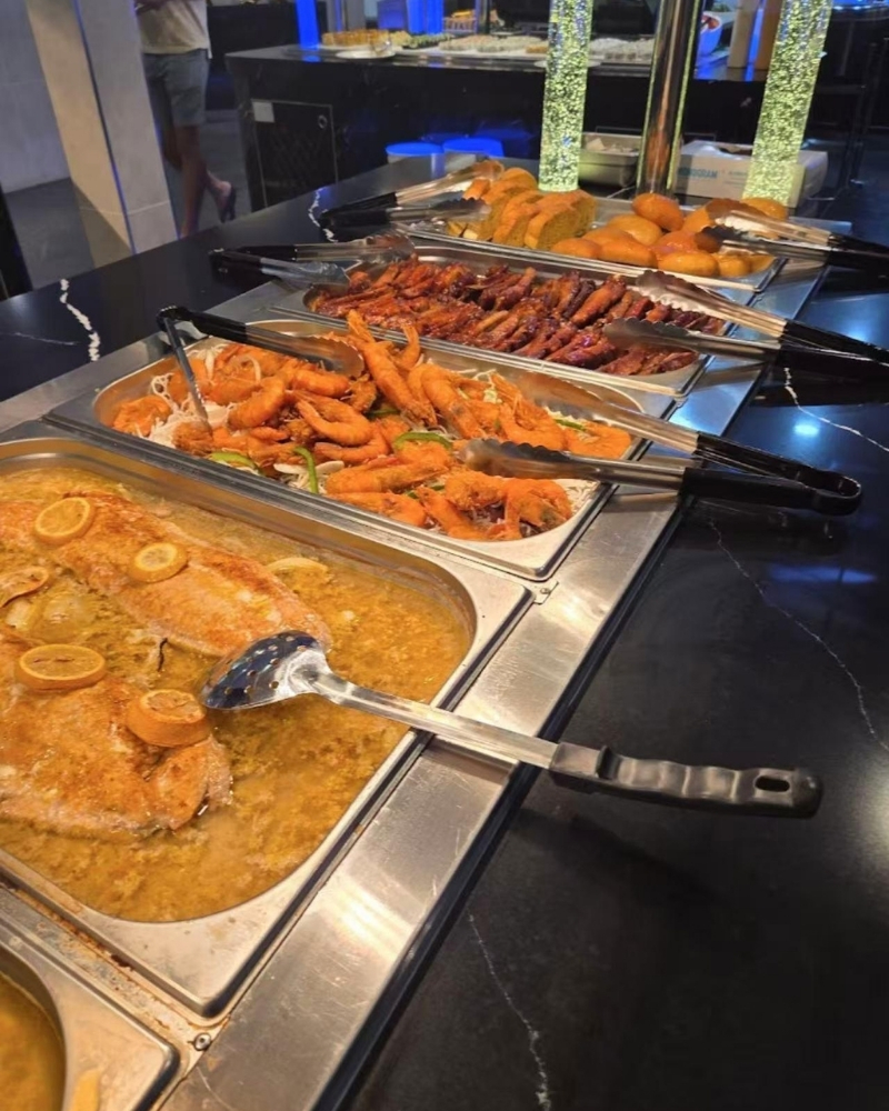 Grilled ribs, fried shrimp and lemon fish at Madness Buffet, a Buffet Restaurant in Pompano Beach