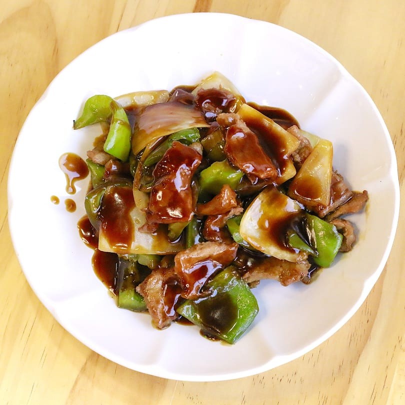 Pepper and onion beef stir-fry with glossy sauce at Main Garden, a Chinese Fusion Restaurant in Passaic