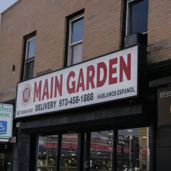 Storefront sign of Main Garden Chinese restaurant at Main Garden, a Chinese Fusion Restaurant in Passaic