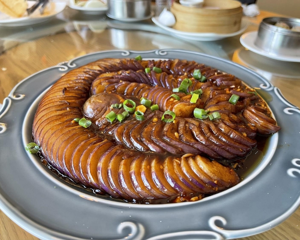Braided braised eggplant with savory sauce at Mama Chang，a Chinese Restaurant in Colmar