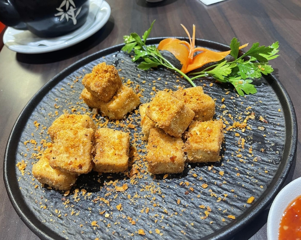 Crispy fried tofu cubes with seasoning crumbs at Mama Chang，a Chinese Restaurant in Colmar