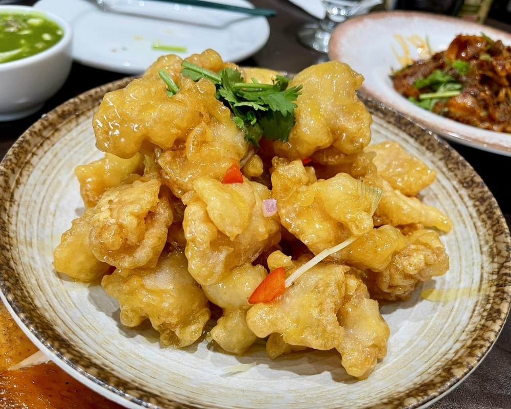 Glazed fried sweet and sour pork pieces at Mama Chang，a Chinese Restaurant in Colmar