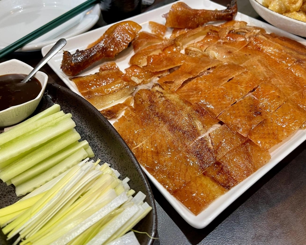 Sliced Peking duck with scallions and cucumber at Mama Chang，a Chinese Restaurant in Colmar