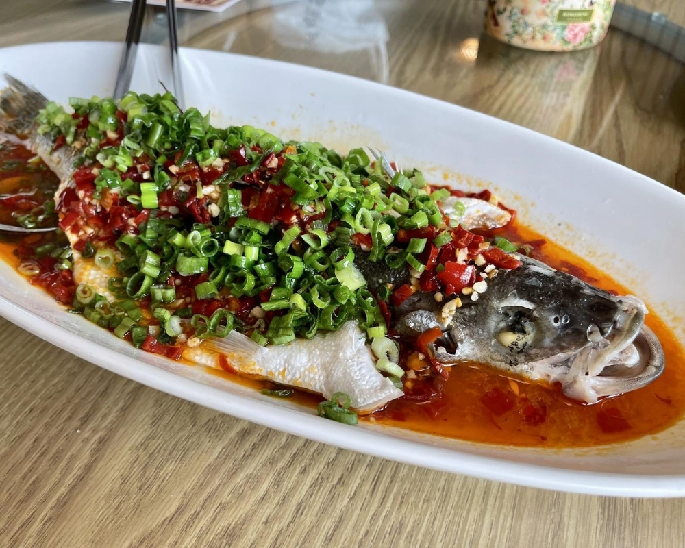Steamed sea bass with chopped chili and green onions at Mama Chang，a Chinese Restaurant in Colmar