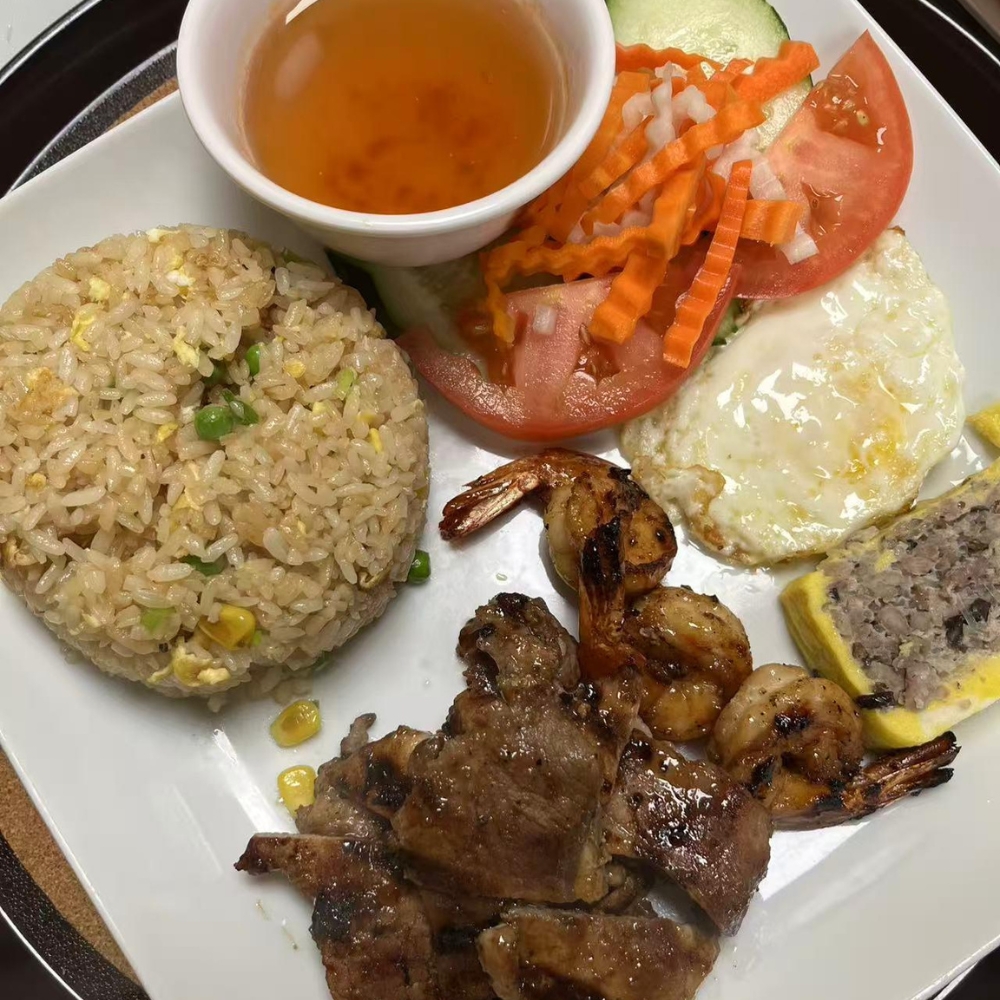 Mama-Hong’s-Pho-&-Bistro-Vietnamese-Restaurant-Combo-Plate-Mustang A combo plate with fried rice, grilled meat, shrimp, and egg at Mama Hong's Pho & Bistro, a Vietnamese Restaurant in Mustang.