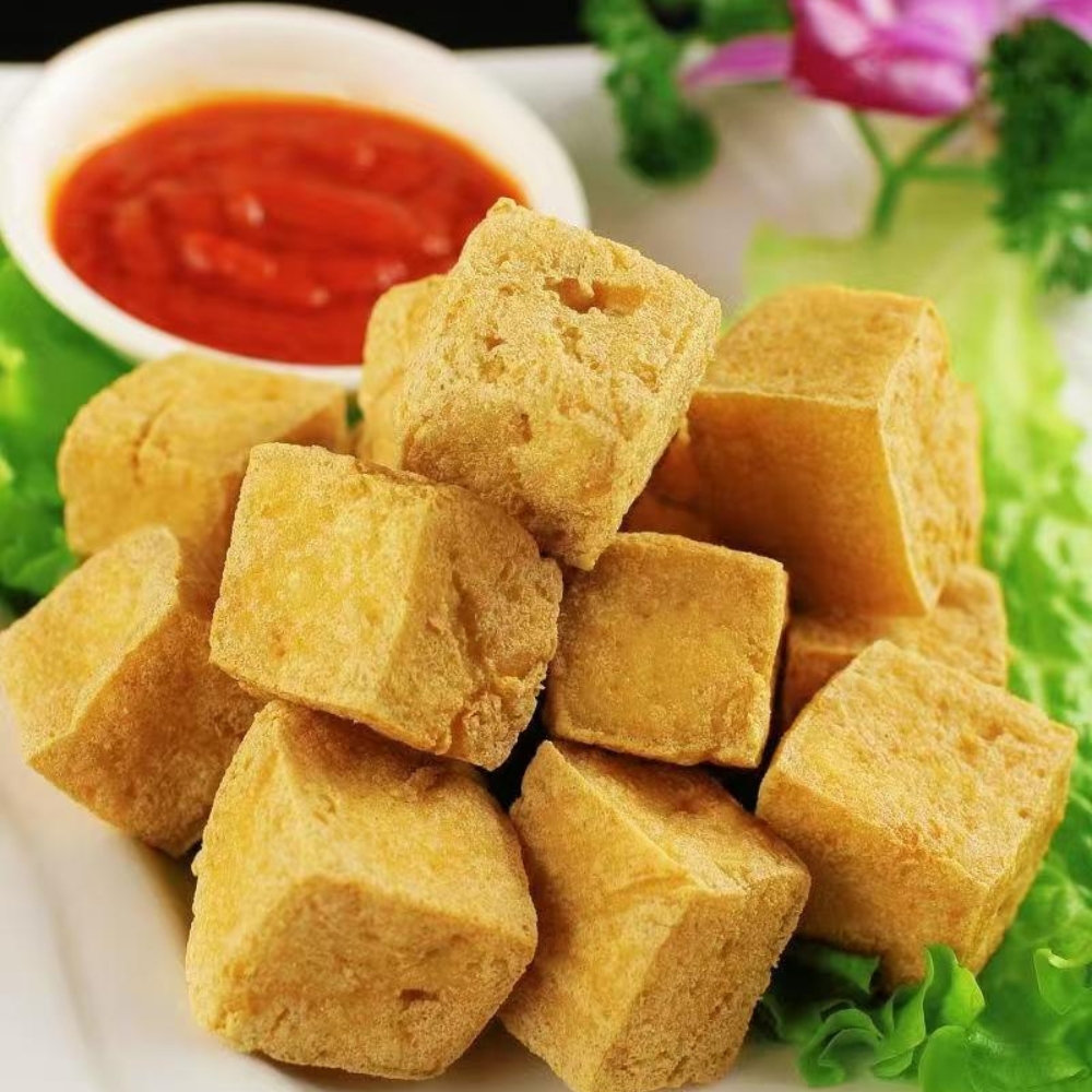 Mama-Hong’s-Pho-&-Bistro-Vietnamese-Restaurant-Fried-Tofu-Cubes-Mustang Crispy fried tofu cubes served with a red dipping sauce at Mama Hong's Pho & Bistro, a Vietnamese Restaurant in Mustang.