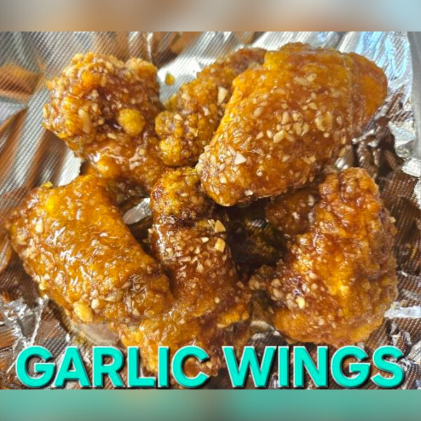 Mama-Mias-Pizza-&-Wings-Pizza-restaurant-Garlic-Chicken-Wings-Philadelphia Fried wings tossed in garlic - infused sauce at Mama Mias Pizza & Wings, a Pizza restaurant in Philadelphia