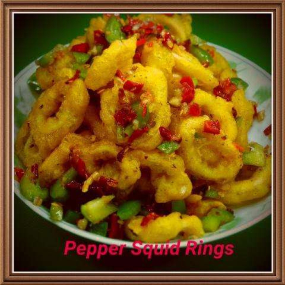 Maple-Garden-Chinese-Restaurant-Pepper-Squid-Rings-Whitby Crispy pepper squid rings with peppers at Maple Garden, a Chinese restaurant in Whitby.