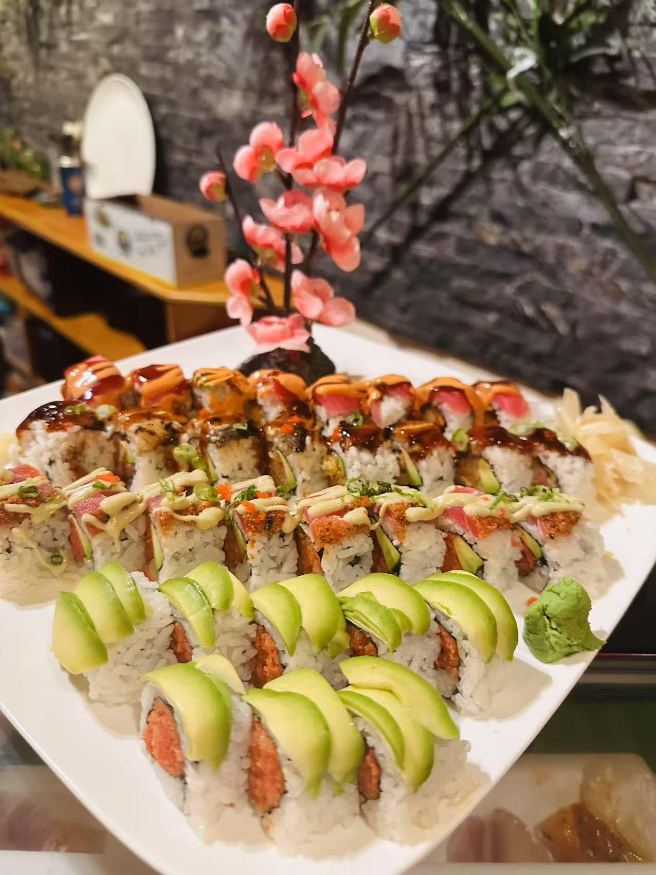 Sushi Grand Platter Various sushi rolls with avocado and fresh toppings at Masa Sushi, a Japanese restaurant in Somerville