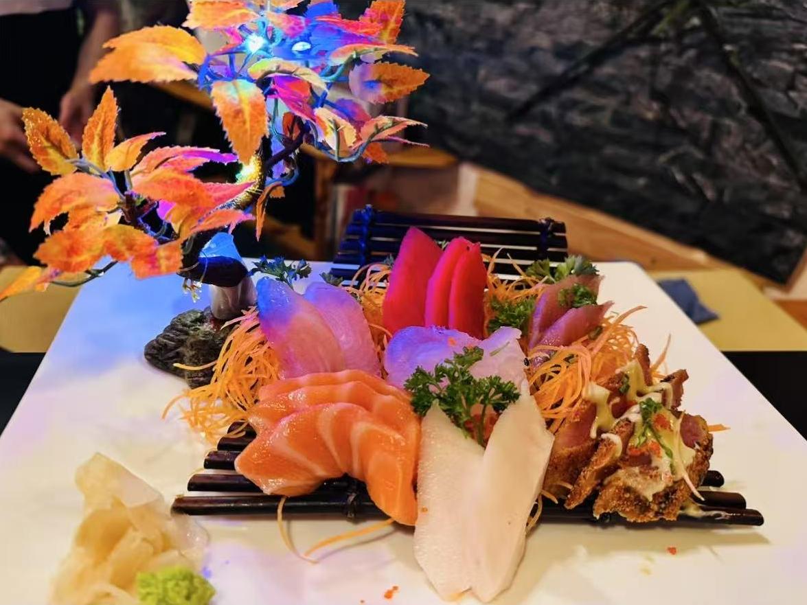 Sashimi Platter Fresh assorted raw fish with decorative elements at Masa Sushi, a Japanese restaurant in Somerville