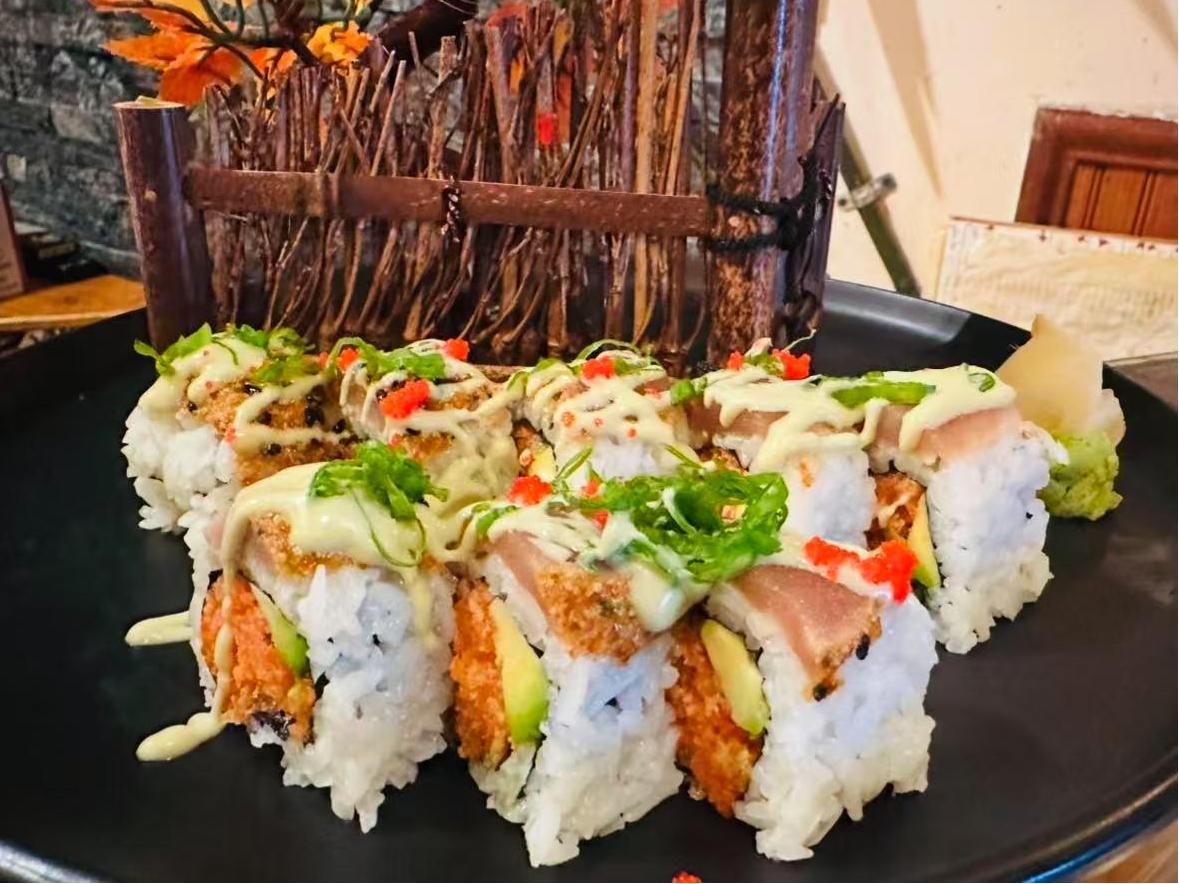 Gourmet Sushi Rolls Premium sushi rolls with fresh fish and green toppings at Masa Sushi, a Japanese restaurant in Somerville