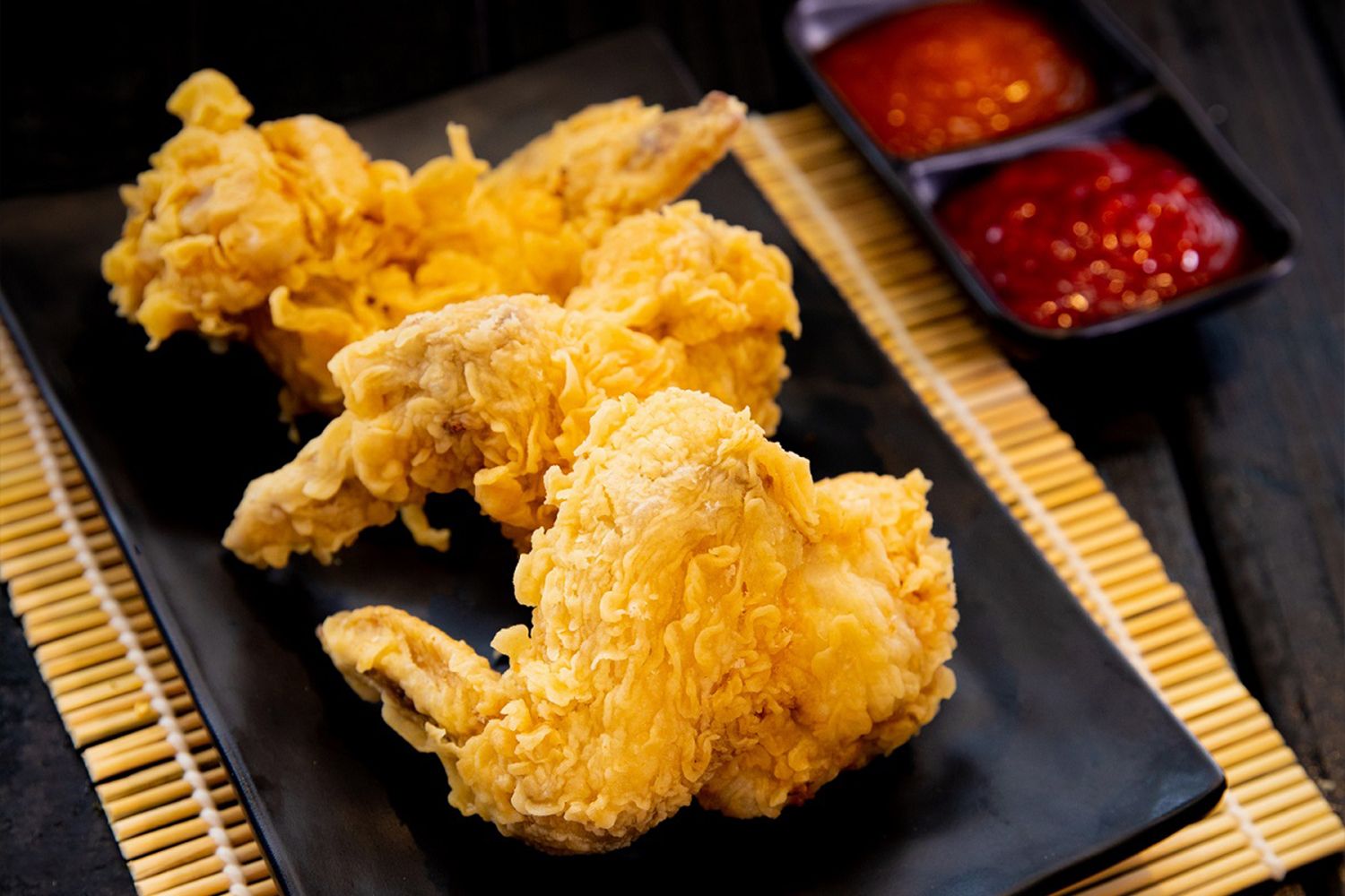 Crispy fried chicken wings with dipping sauces at MBL & Q Burger, Fried Chicken Shop in Rowland Heights