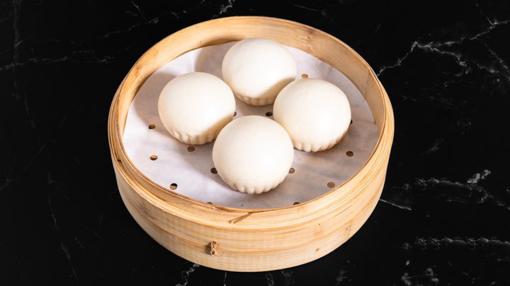 Salted Egg Custard Buns Steamed buns with salted egg filling at M Dumpling, a Chinese restaurant in Fremont