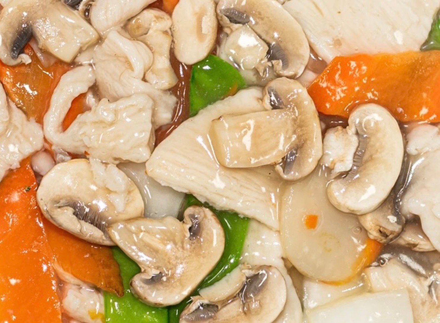 Tender chicken and mushrooms with vegetables in light sauce at Mei-King Restaurant, a Chinese Restaurant in Pawtucket