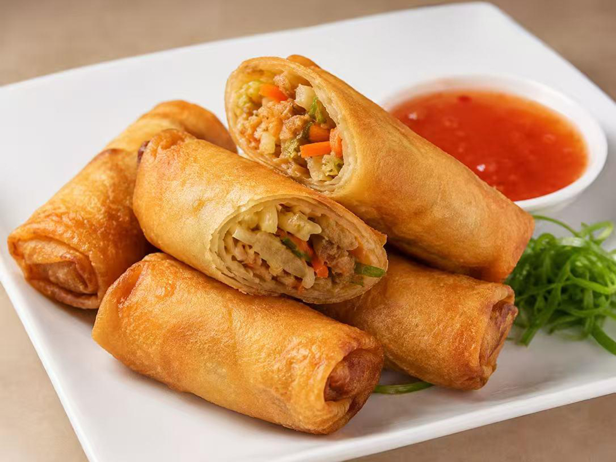 Crispy egg rolls with dipping sauce at Mei's kitchen, a Chinese Restaurant in Knoxville