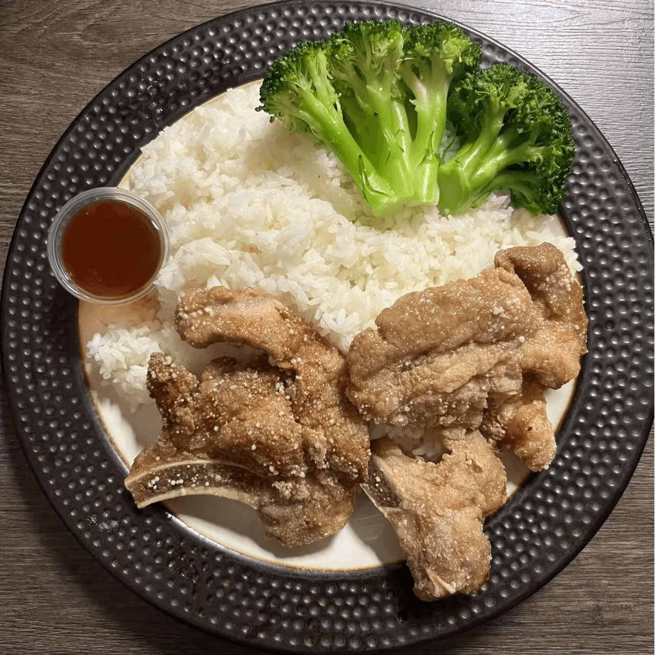 Crispy fried pork chop served with rice and broccoli at Metro Hong Kong Dessert and Milk Tea, a Chinese Hong Kong Restaurant in San Francisco
