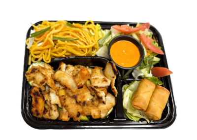 Grilled chicken bento with stir-fried noodle, mixed greens, tomato garnish and two crispy spring rolls at Mex Sushi Taco, a Asian restaurant in Place maspeth
