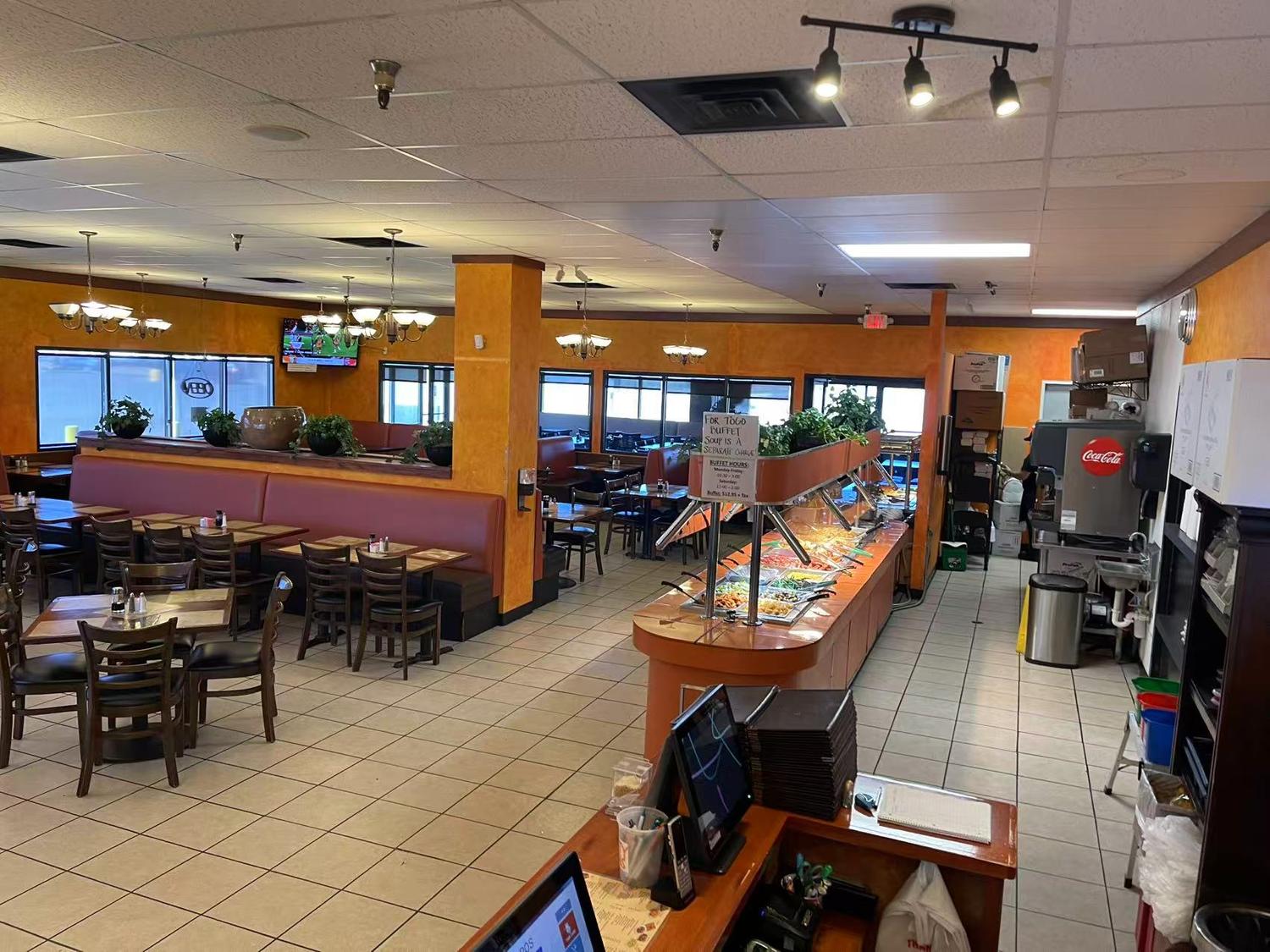 Spacious Chinese buffet dining area with booths and tables