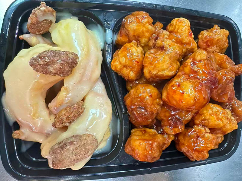 Creamy shrimp, chicken & sweet-sour bites with rice at Ming Garden, a Chinese Restaurant in Huntersville