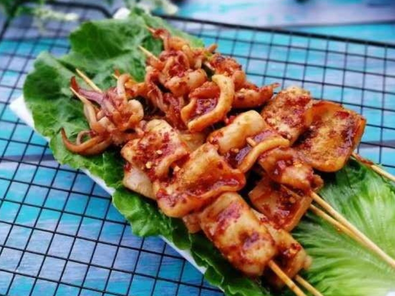 Spicy grilled squid skewers at Pearl BBQ: Chinese Food Truck, a Chinese Restaurant in Elmhurst