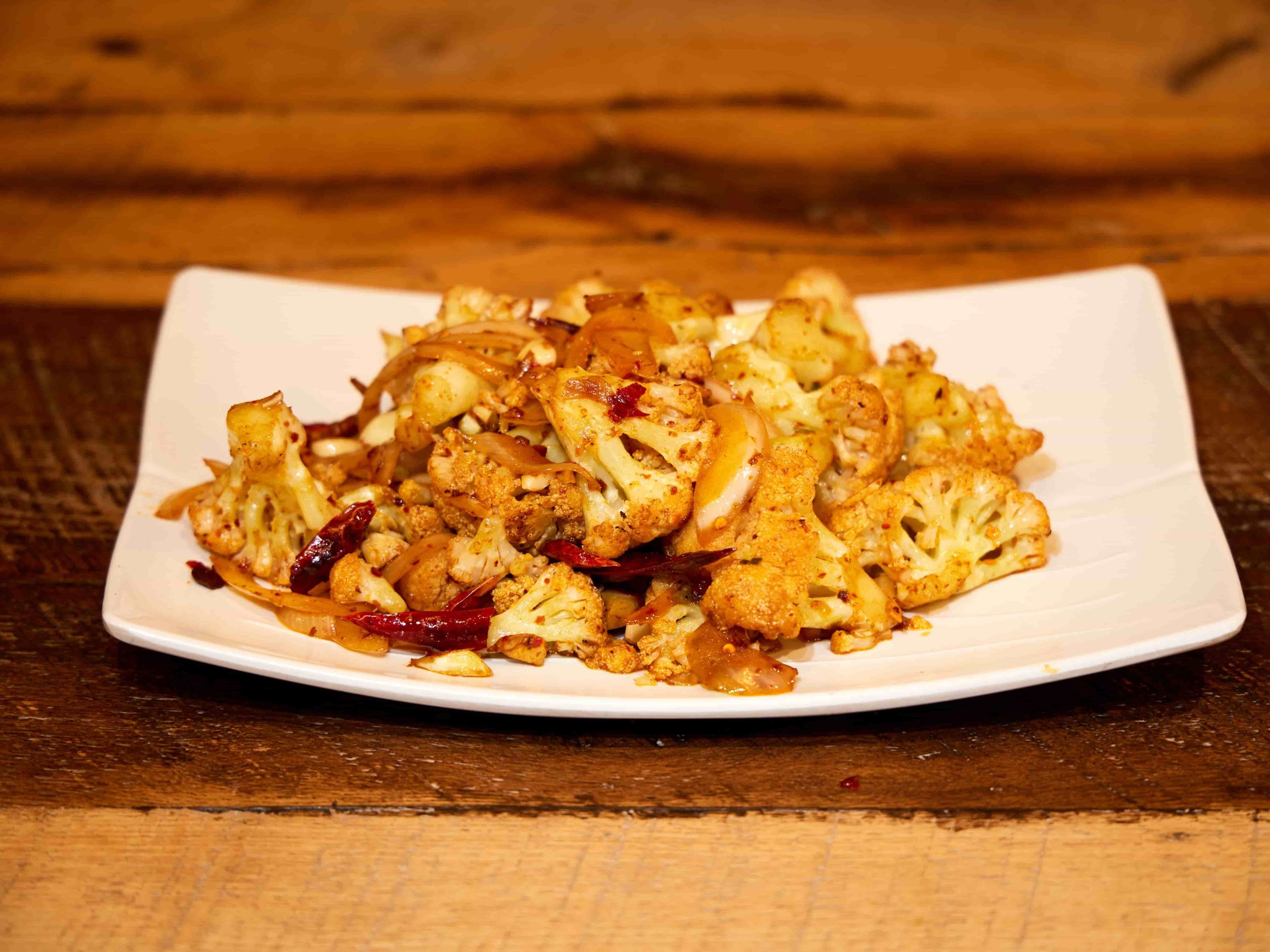 Crispy cauliflower stir-fried with Sichuan chili and garlic at Mini Bowl Express, a Chinese Restaurant in Loma Linda