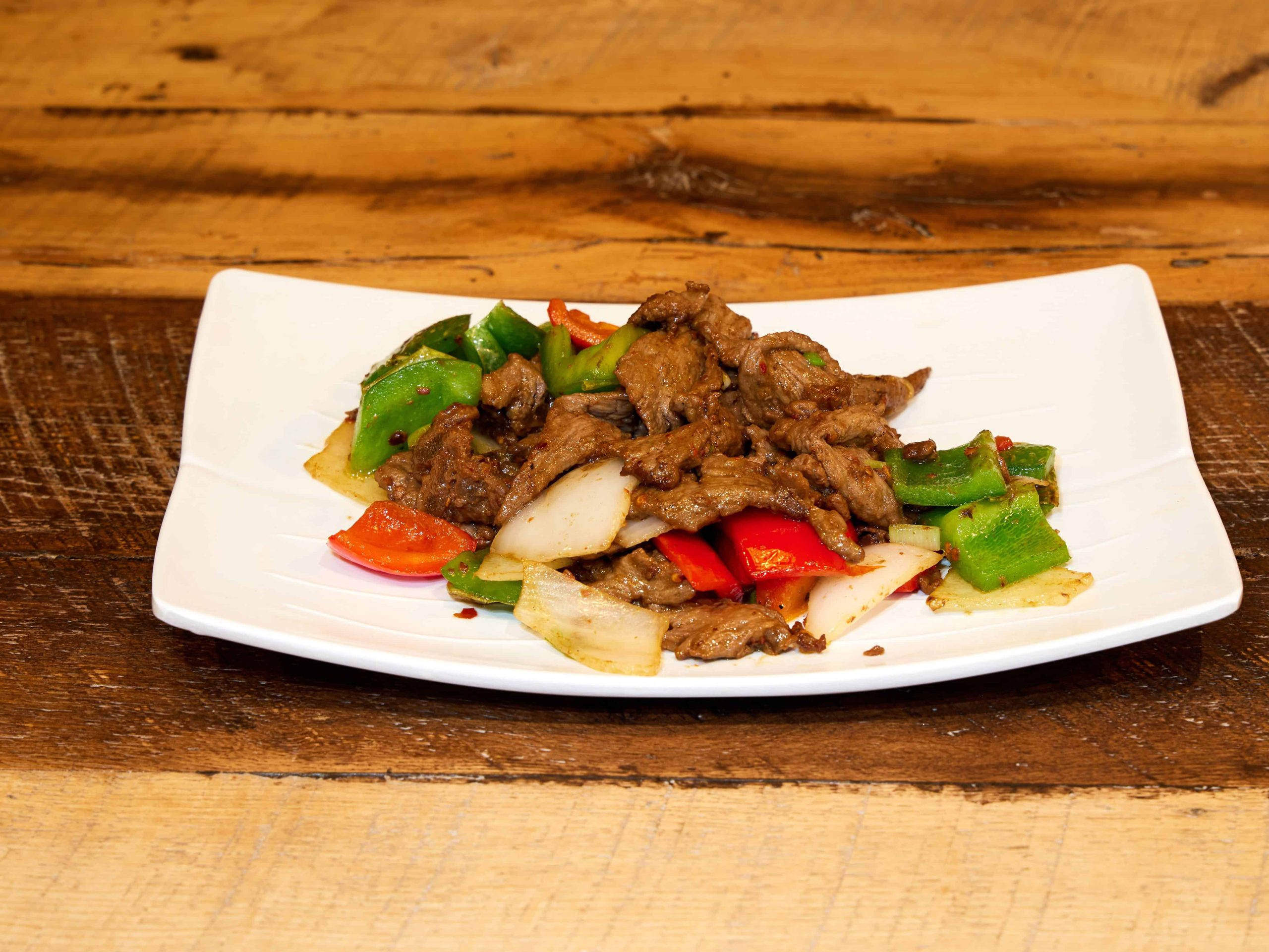 Tender beef stir-fried with bell peppers and onions at Mini Bowl Express, a Chinese Restaurant in Loma Linda