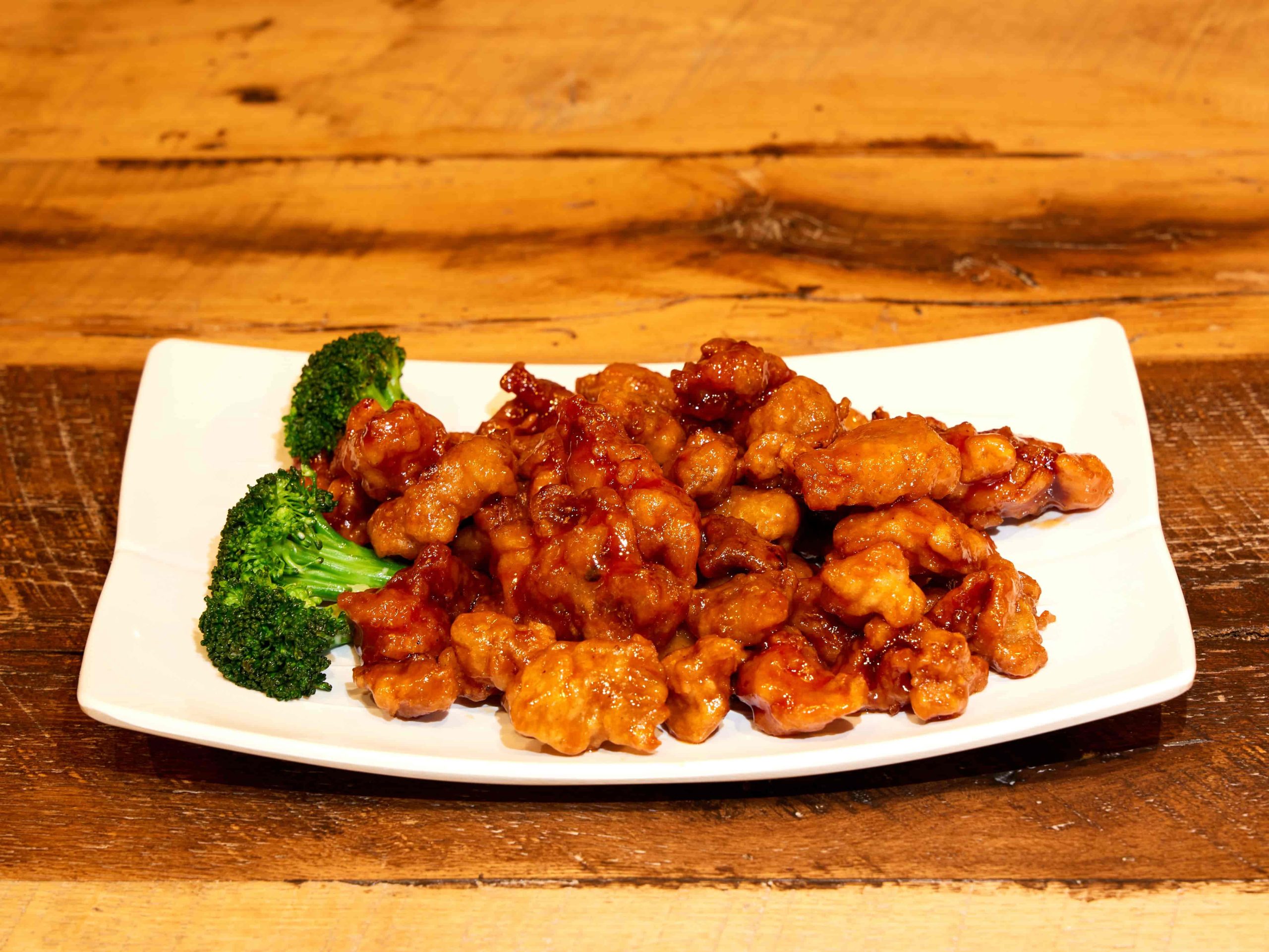 Crispy chicken in sweet and spicy sauce with broccoli at Mini Bowl Express, a Chinese Restaurant in Loma Linda