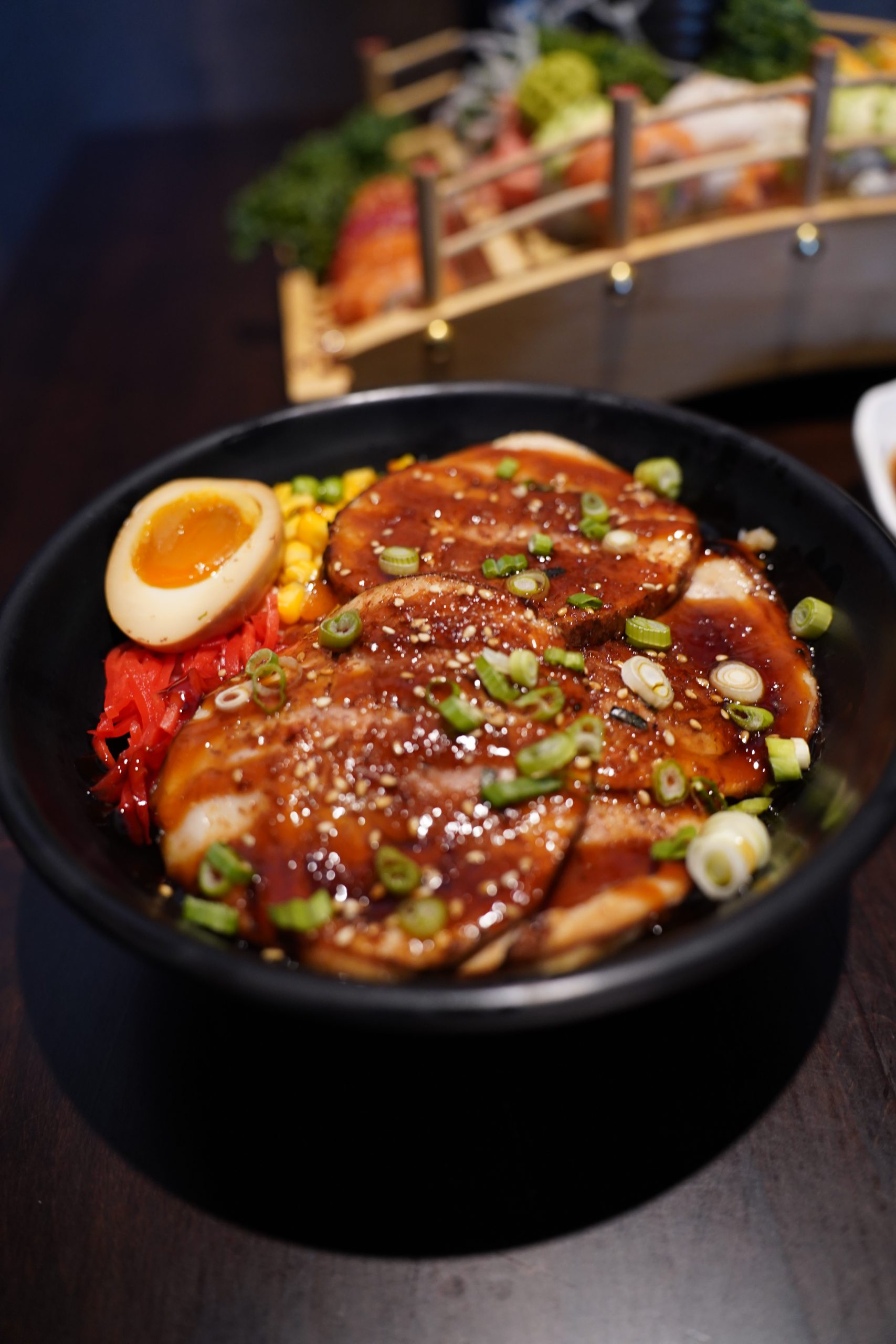 Teriyaki Pork Rice Bowl Tender pork with teriyaki sauce over rice at Mirai ramen & sushi, a Japanese restaurant in Wichita