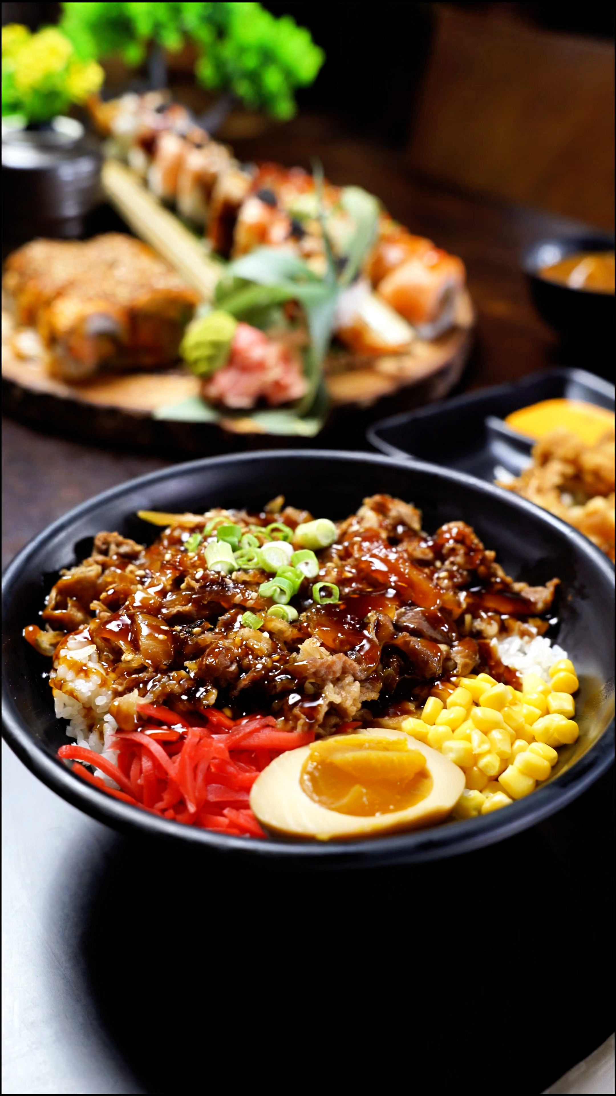 Unagi Sushi Rice Bowl Grilled eel over rice with sushi on the side at Mirai ramen & sushi, a Japanese restaurant in Wichita