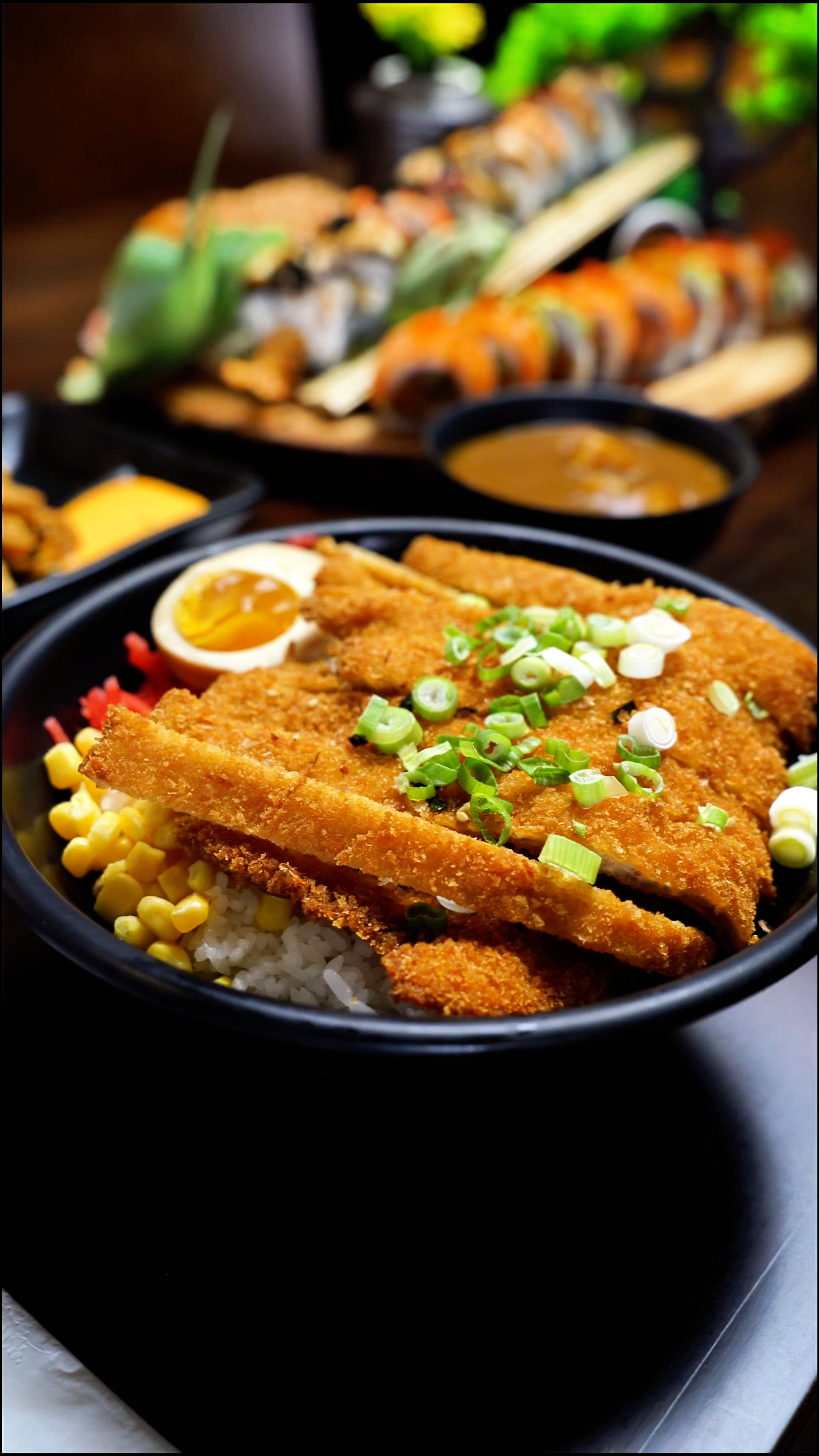 Katsu Rice Bowl Crispy pork cutlet over rice with fresh toppings at Mirai ramen & sushi, a Japanese restaurant in Wichita