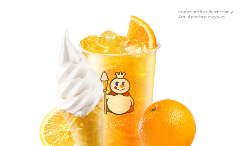 Orange drink with ice and vanilla soft serve cone at MIXUE, an Ice cream shop in Hollywood