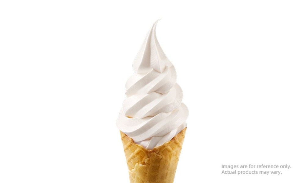 Vanilla flavored soft serve ice cream in a waffle cone at MIXUE, an Ice cream shop in Hollywood