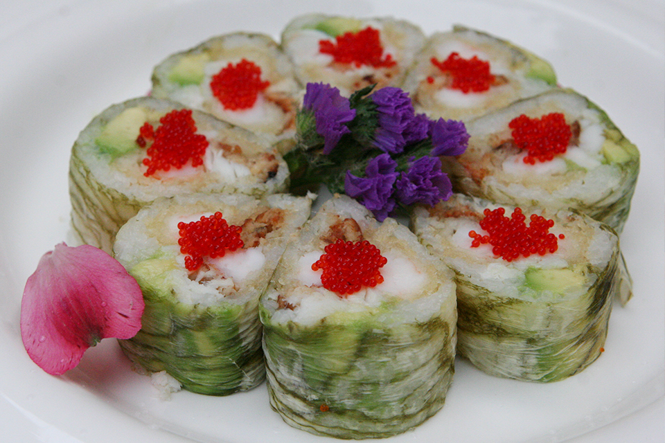 Cucumber-wrapped maki with tobiko at Mizu Hibachi & Sushi, a Japanese Restaurant in New York
