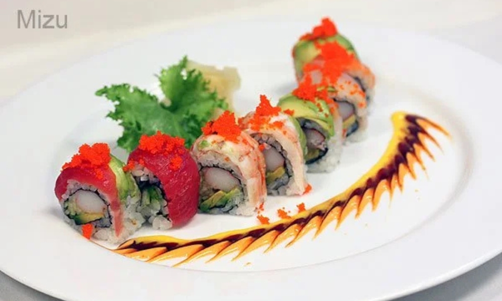 Colorful sushi roll with fish and tobiko at Mizu Japanese Restaurant, a Japanese Restaurant in Winston-Salem
