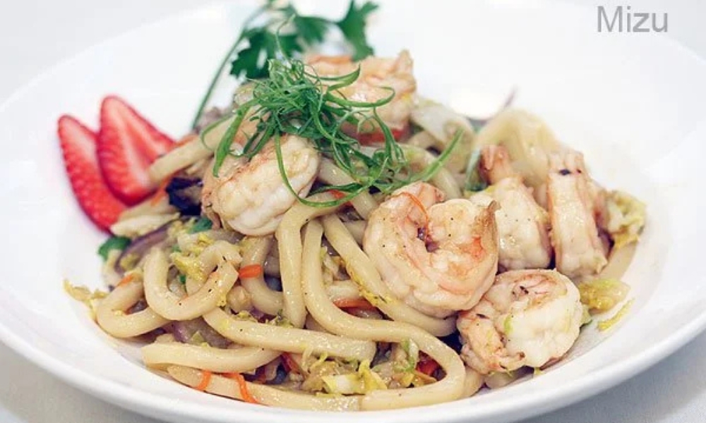 Shrimp yaki udon with veggies and strawberry at Mizu Japanese Restaurant, a Japanese Restaurant in Winston-Salem