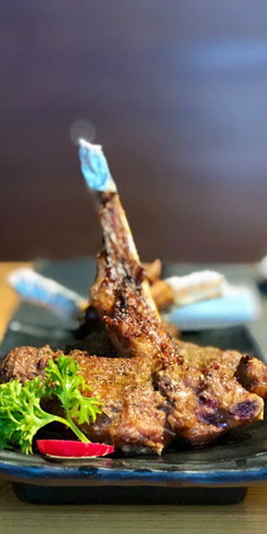 Marinated grilled lamb chops with fresh herbs at Moana Hawaiian BBQ Restaurant in Fairfield