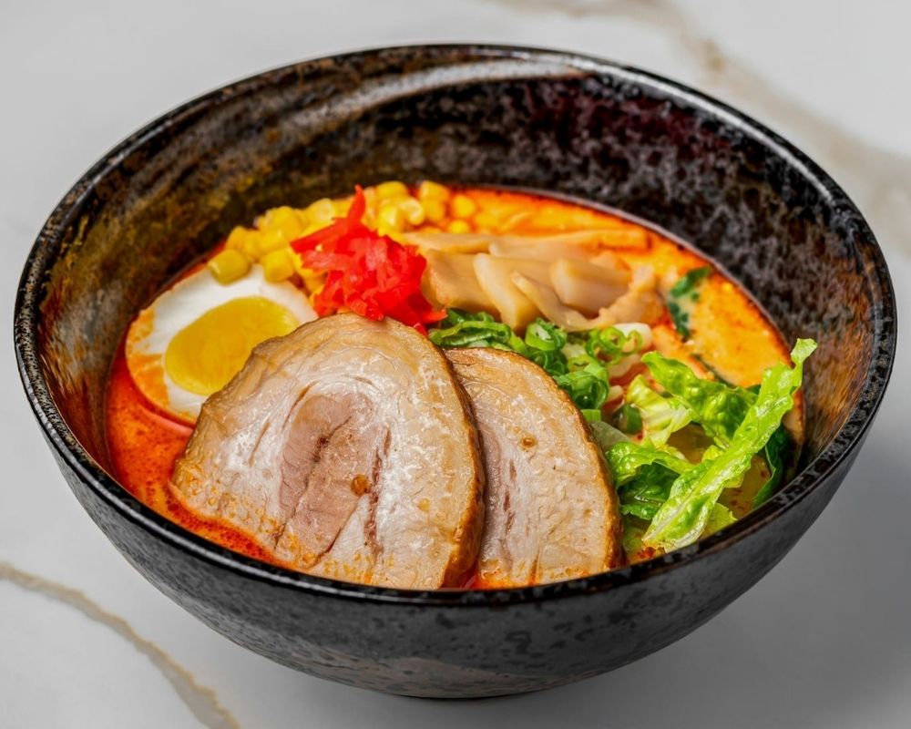 Spicy red broth ramen with chashu pork and lettuce at Modern Tea・Salad, Salad shop in New York