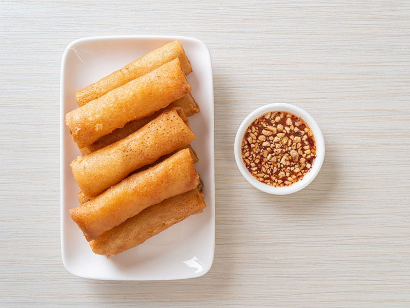 Crispy fried spring rolls with zesty dipping sauce at MOJO Teriyaki, a Asian Restaurant in Brentwood