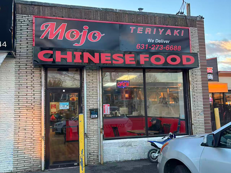 MOJO Teriyaki's storefront sign with delivery info at MOJO Teriyaki, a Asian Restaurant in Brentwood