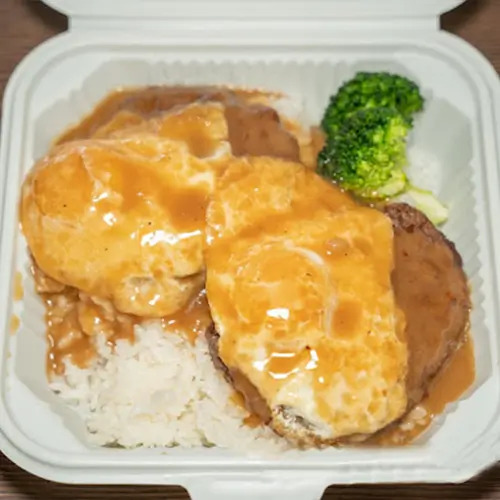 Loco Moco with hamburger patty, eggs, gravy, rice, and broccoli at Moku Hawaiian BBQ, a Hawaiian Restaurant in San Pablo